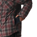 The 686 Woodland Insulated Jacket 2025 is depicted in a red and black plaid pattern with an insulated hood.
