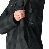 The 686 Woodland Insulated Jacket 2025 in black and gray plaid features an insulated hood.