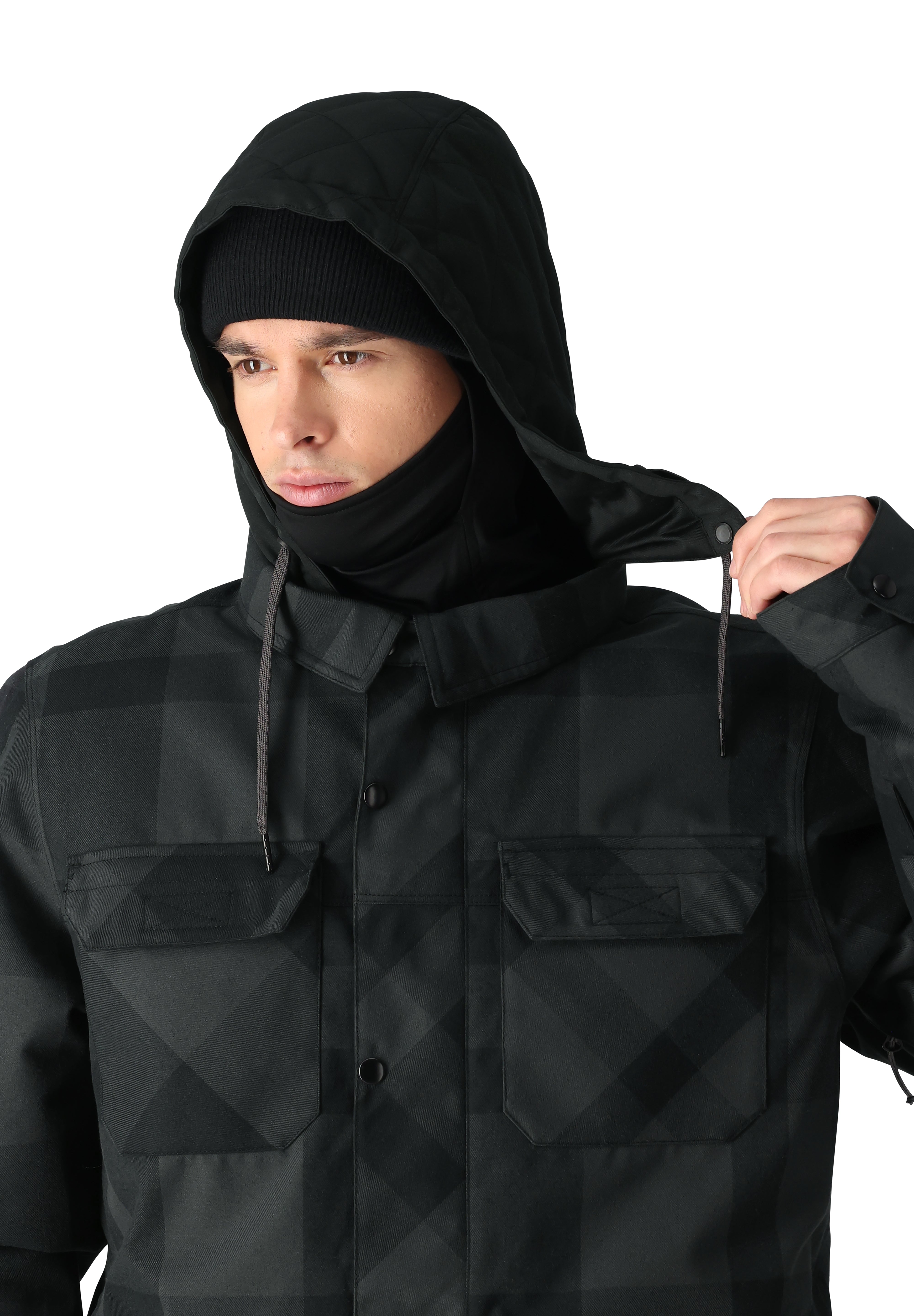 The 686 Woodland Insulated Jacket 2025 is predominantly black with a subtle plaid pattern and an insulated hood.