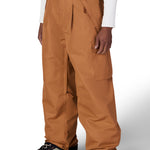 Men's caramel cargo pants with button waistband, front pockets, and cargo flap details
