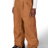 Men's caramel cargo pants with button waistband, front pockets, and cargo flap details