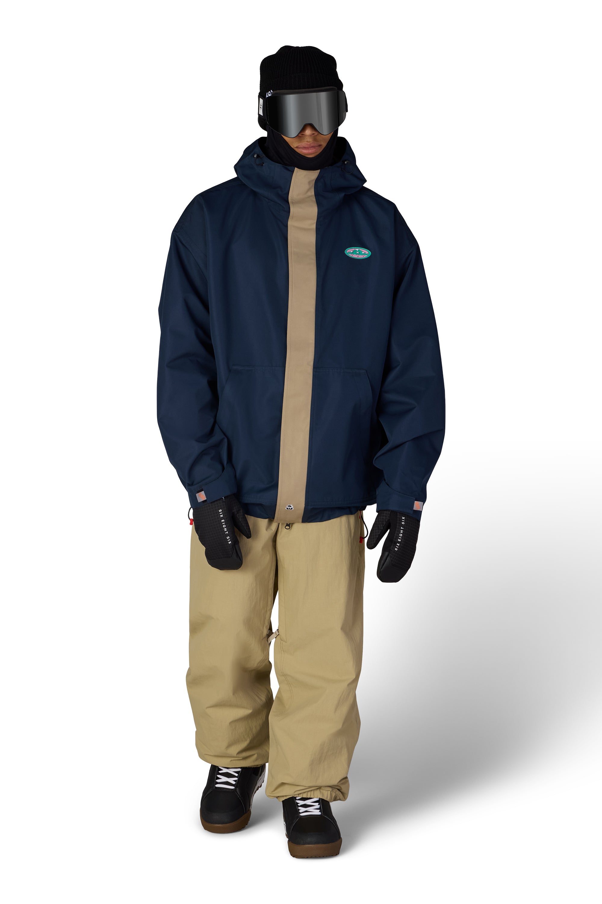 Men's navy ski jacket with hood, front zipper, and tan lining