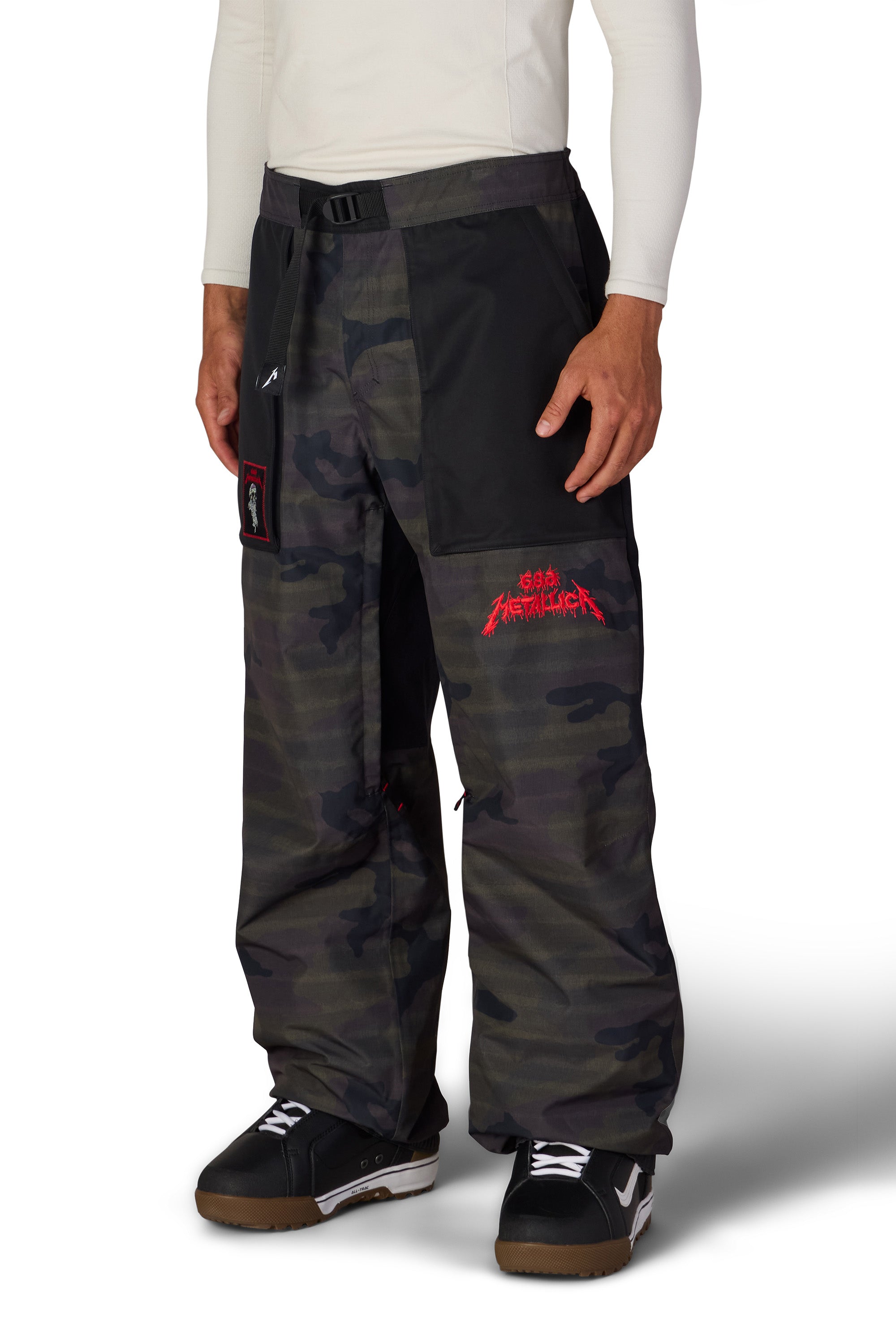Men's one-shell ski pants, dark camo with black panels and red logo on leg