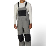 Gray insulated bib overalls with black chest pocket panel and adjustable suspenders