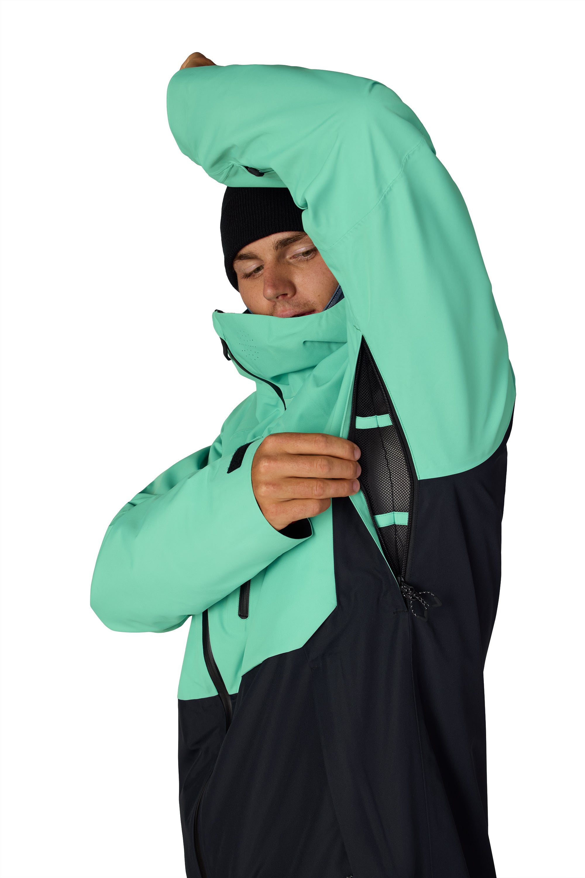 Men's mint green and black hooded snow jacket, close-up of front zipper and chest pocket.