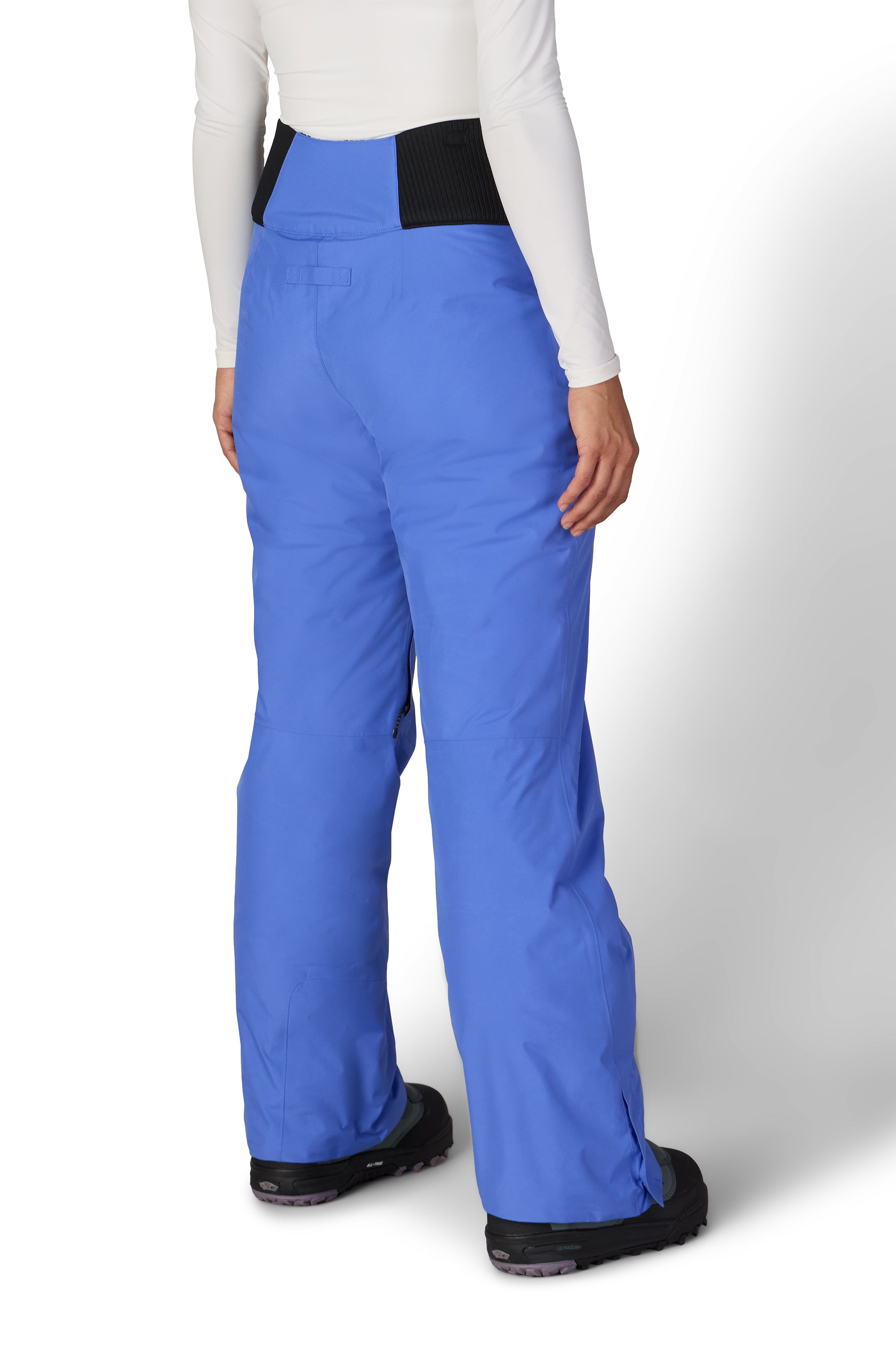 Blue insulated ski pants with straight leg fit and covered ankle cuffs