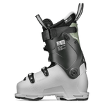 White and black ski boot side with cuff strap and adjustable buckles