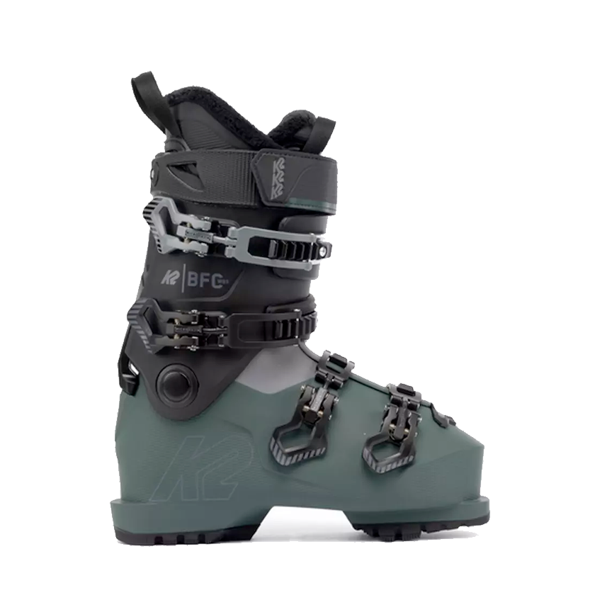 The image shows a pair of K2 Women's BFC 85 Ski Boots for the year 2022. The boots are gray and feature a BOA dial closure system, which is visible on the side of one boot. They have a black strap around the top and appear to be designed for skiing.