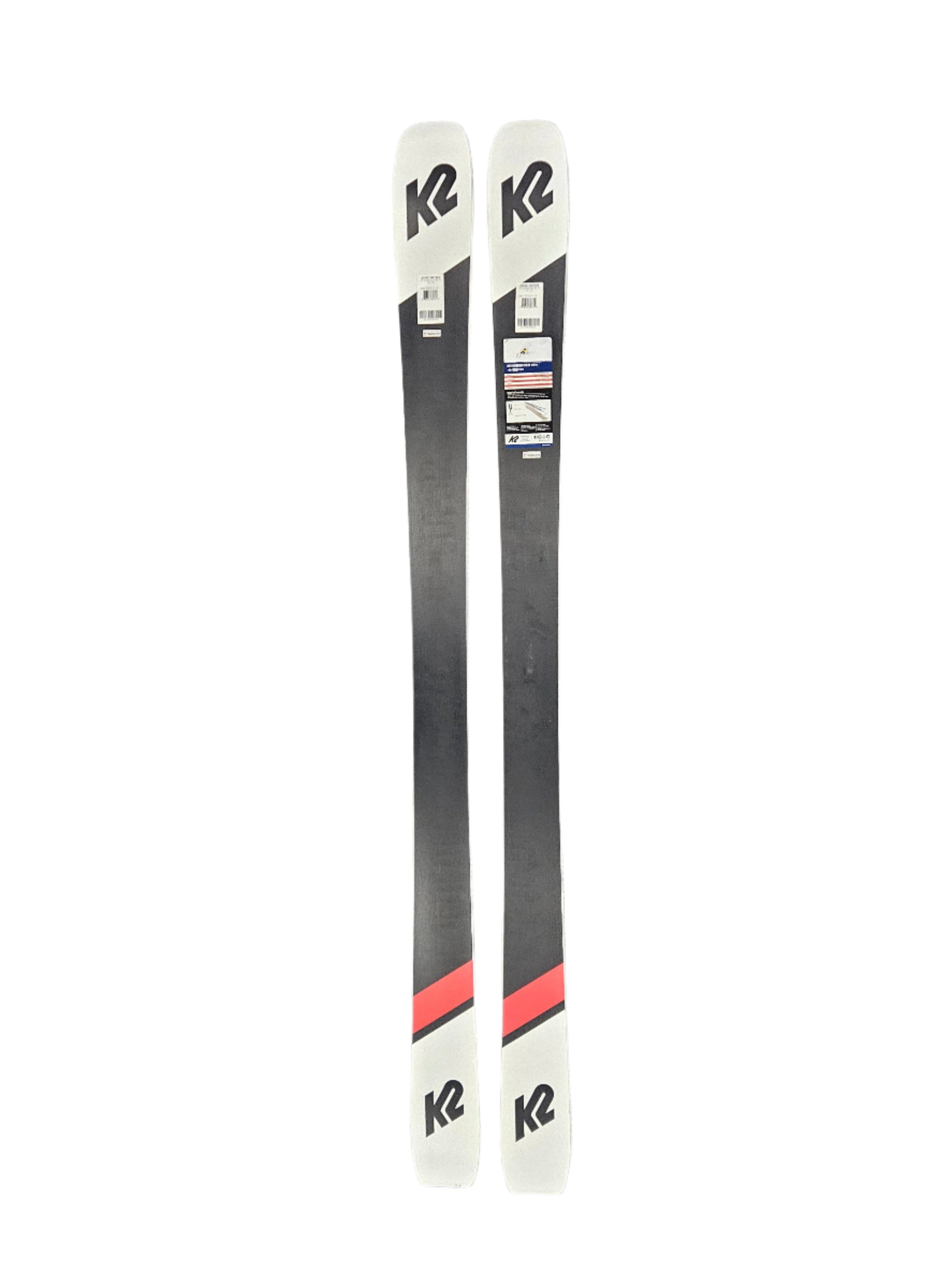 K2 Mindbender 99 Ti skis feature a black and red design with a clear top section.