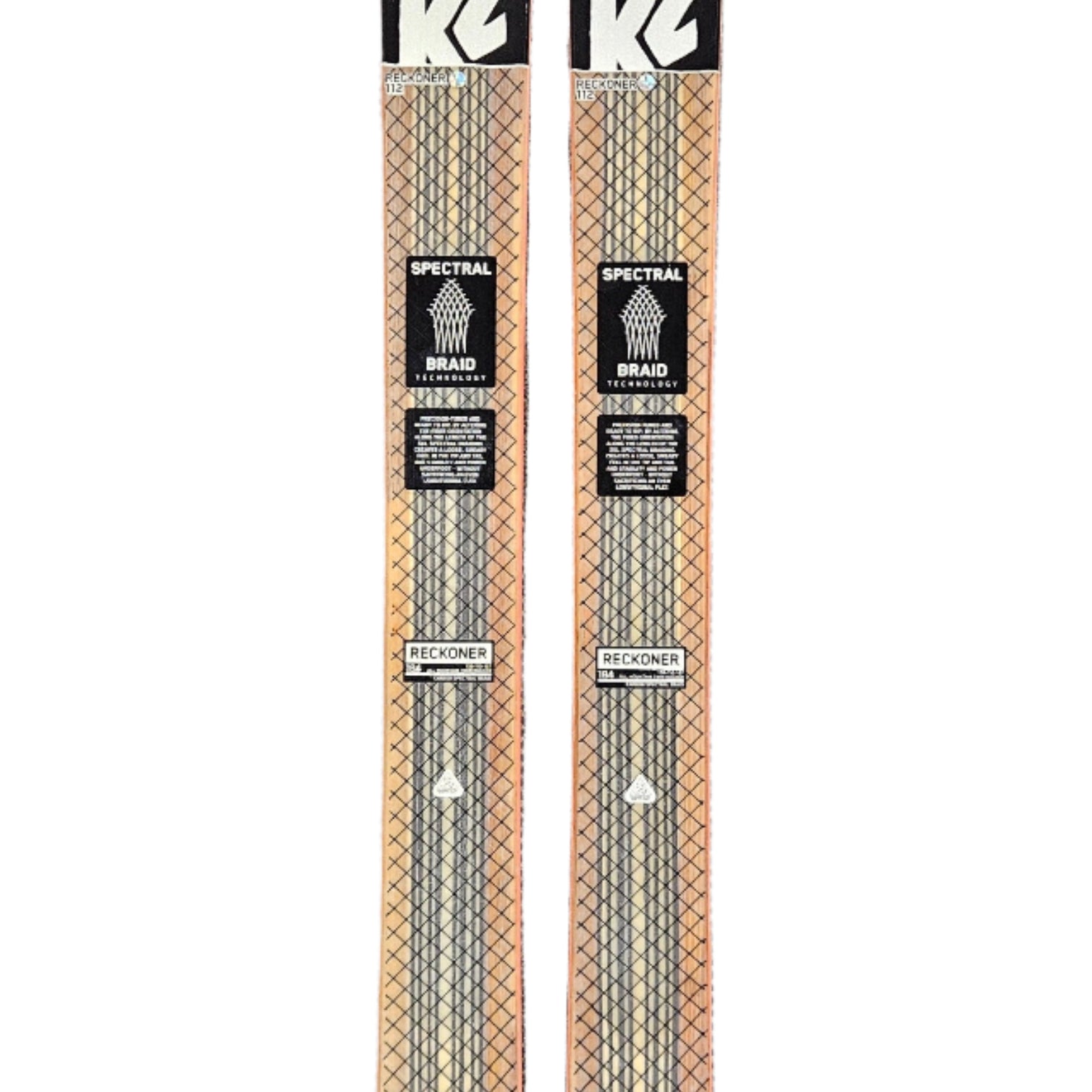 K2 Reckoner 112 skis, 2021 model, feature a clear top section and distinctive striped design.