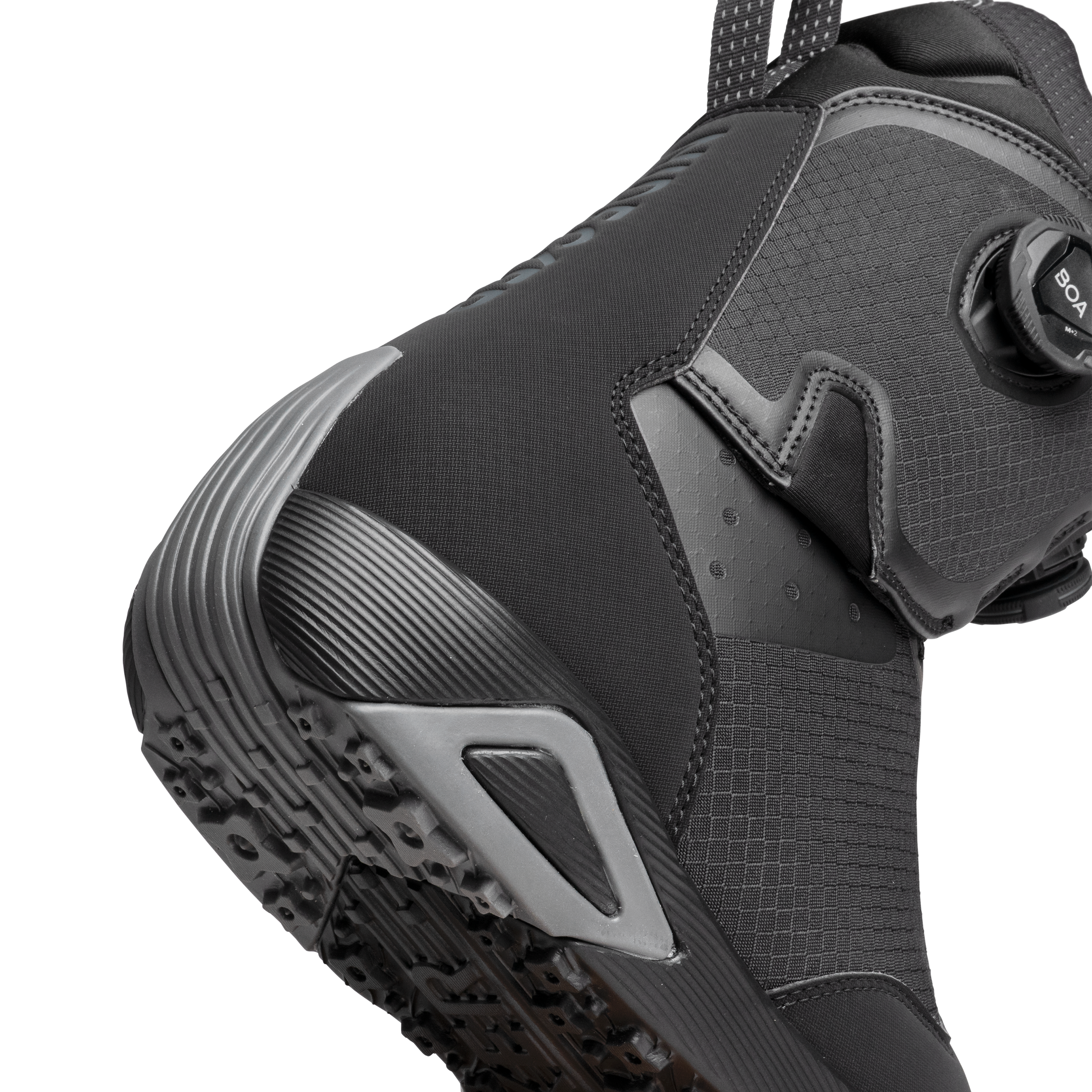 Black snowboard boot with BOA dial closure, textured upper and padded collar.