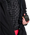 Burton Women's Lelah 2L Jacket 2025 - A black jacket with a white grid pattern on the inside lining.