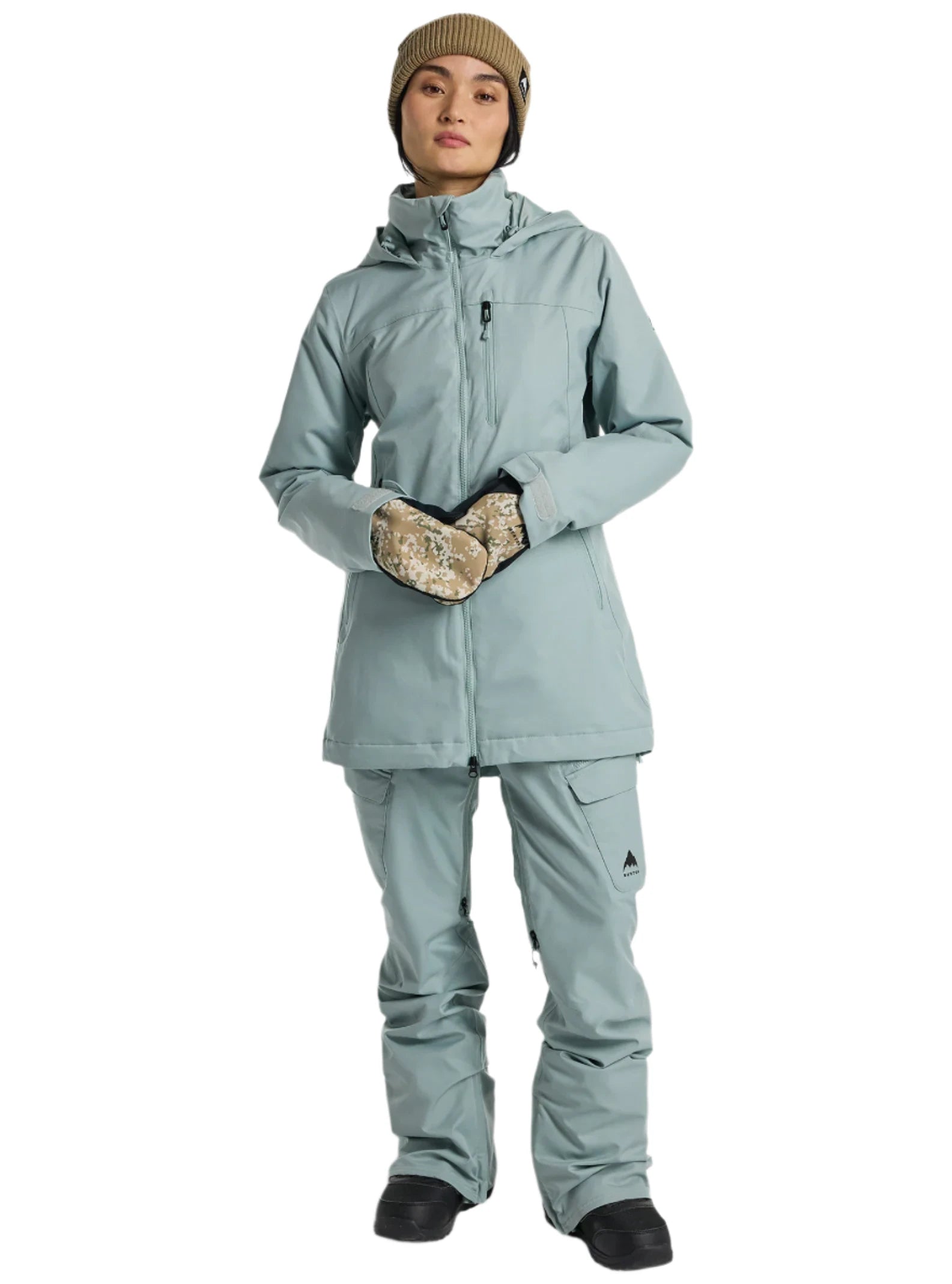 Burton Women's Lelah 2L Jacket 2025 - A light blue jacket with a hood, zippered pockets and a black zipper.