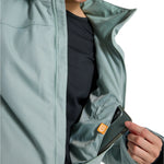 Burton Women's Lelah 2L Jacket 2025 - A light blue jacket with a hood, featuring a zipper and two pockets on the front.