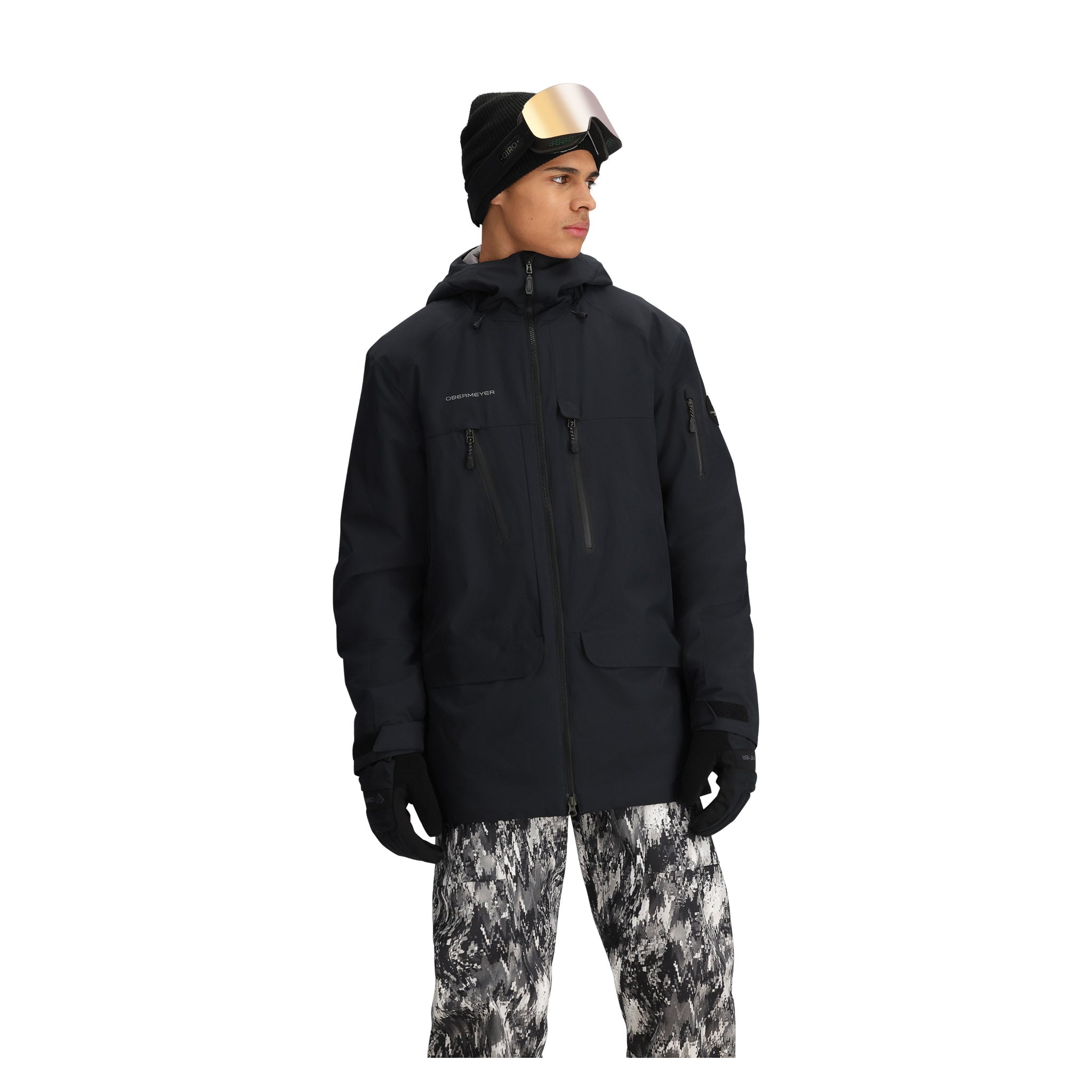 Obermeyer Cirque Jacket 2025 - A black jacket with a zippered chest pocket and two zippered side pockets, featuring a hood and adjustable cuffs.