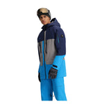 Obermeyer Cirque Jacket 2025 - A navy blue jacket with gray and light blue accents, featuring a hood and zippered pockets.
