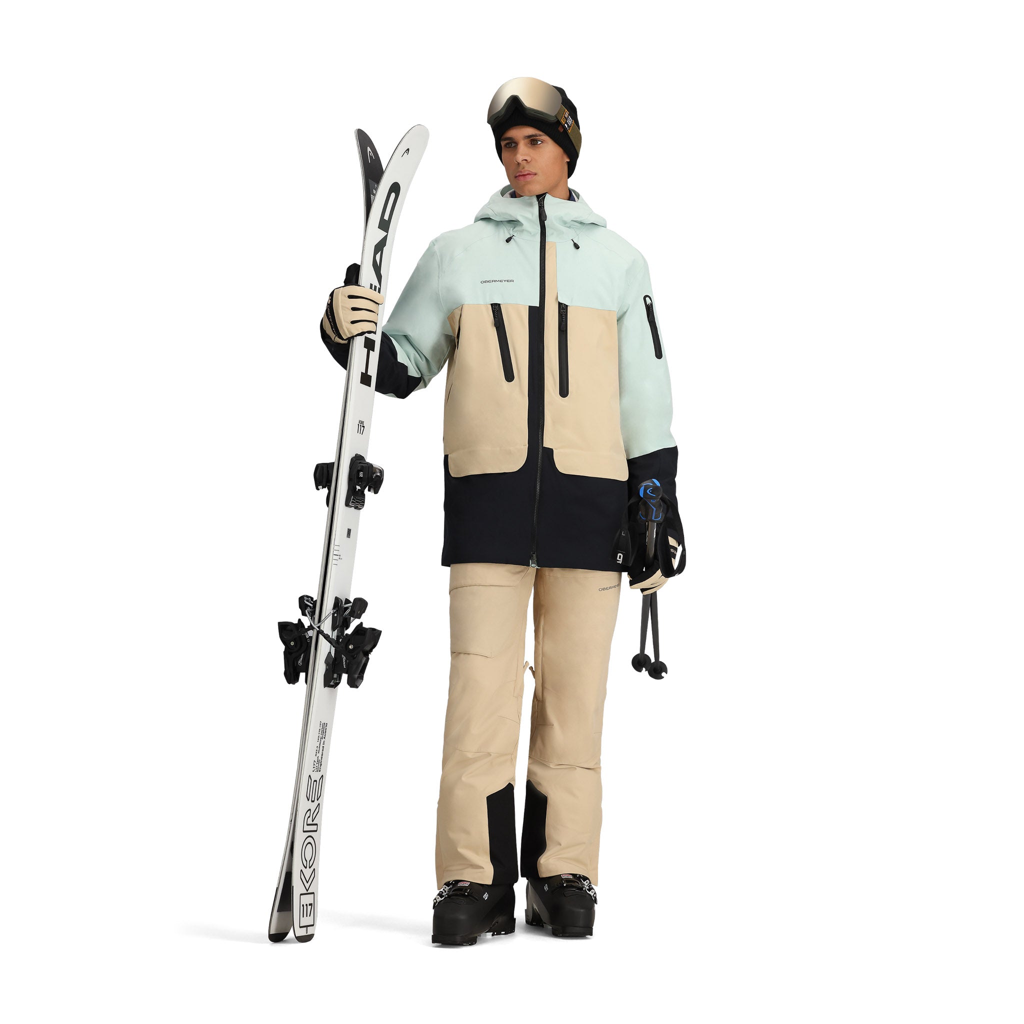 Obermeyer Cirque Jacket 2025 - A light blue jacket with a black zipper and two zippered pockets on the front.