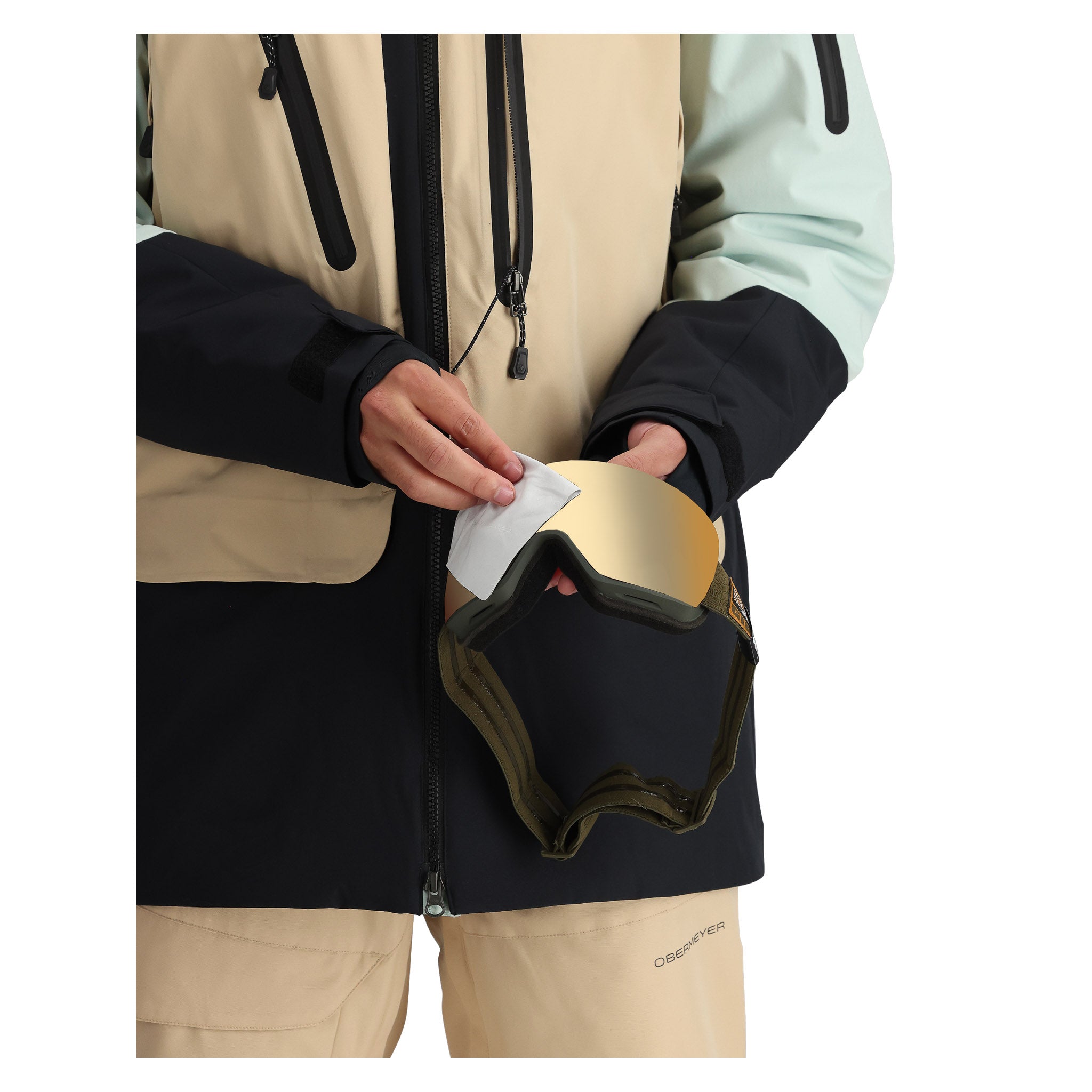 Obermeyer Cirque Jacket 2025 - A tan jacket with black accents and a zippered chest pocket.