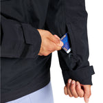 Burton Frostner 2L Anorak Jacket 2025 - A black jacket with a blue logo on the chest and a white tag on the left sleeve.
