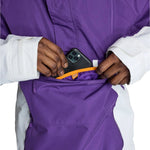 Burton Frostner 2L Anorak Jacket 2025 - A purple jacket with a white stripe on the left sleeve and a zipper pocket on the right side.