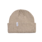 Coal Frena Low Profile Beanie 2025 - A tan beanie with a white label featuring the word "COAL" in black letters.