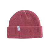 Coal Frena Low Profile Beanie 2025 - A dusty rose-colored beanie with a white label featuring the word "coal" in black letters.