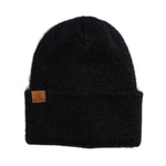 Coal Women's Pearl Fuzzy Knit Beanie - A black beanie with a fuzzy texture and a small brown leather label on the front that says "COAL" in white letters.