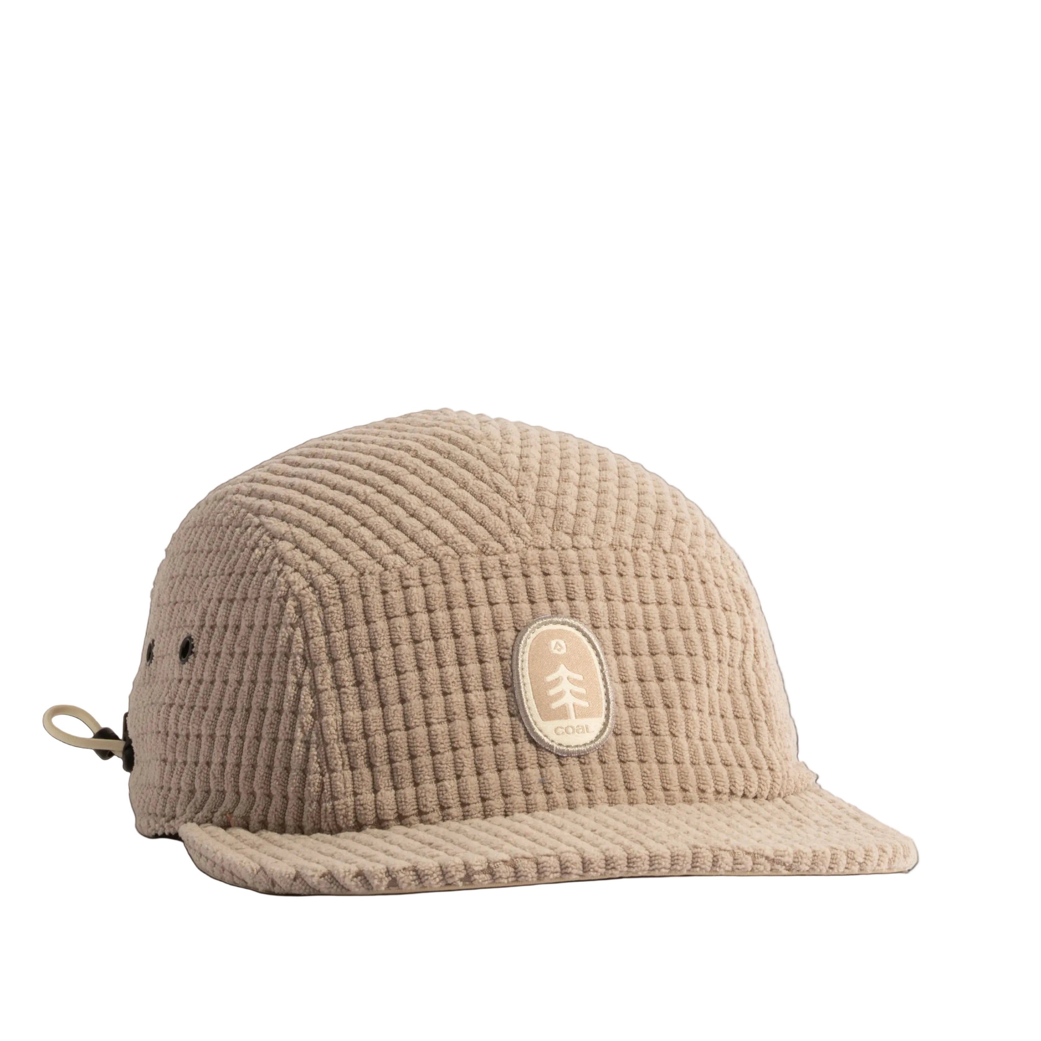 Beige bucket hat with a logo on a light beige background