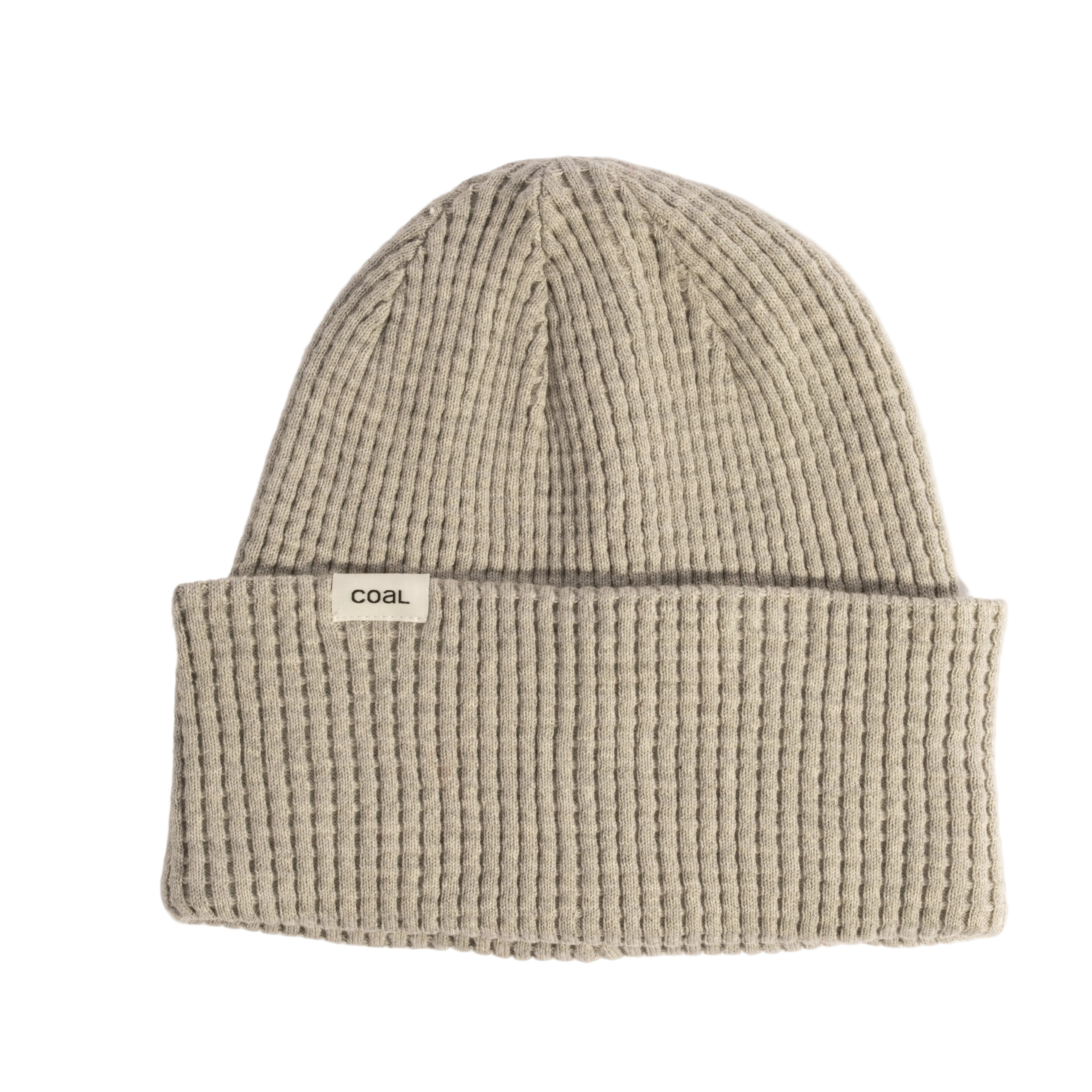 Beige knit beanie with 'COAL' label on a light gray background