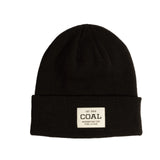Black beanie with a coal label on a light gray background