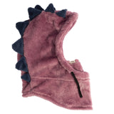 Pink plush dinosaur hood with blue spikes on a light background