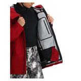 Obermeyer Foraker Shell Jacket 2025 - A red, black, and gray jacket with a zippered chest pocket on the right side.