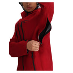 Obermeyer Foraker Shell Jacket - A red jacket with black zippers and a hood, featuring a zippered chest pocket on the left side.