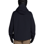 Black shell jacket back view with full hood and zipper; hem over tan pants.