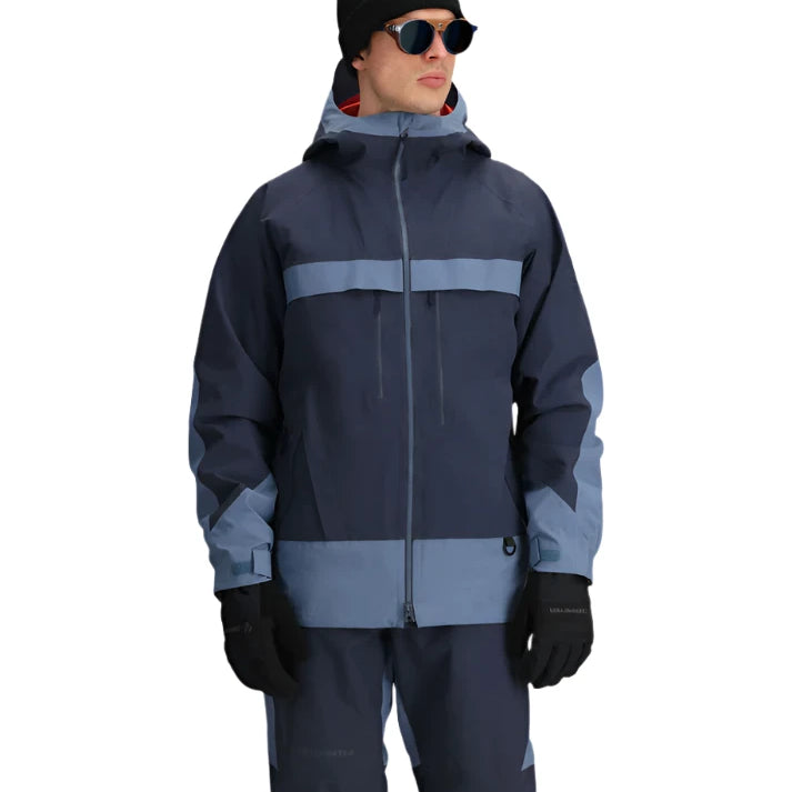 Obermeyer Steibis Jacket 2025 - A navy blue jacket with a light blue stripe across the chest and two pockets on either side of the waist.