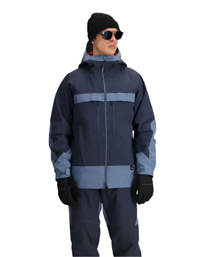 Obermeyer Steibis Jacket 2025 - A navy blue jacket with a light blue stripe across the chest and two pockets on either side of the waist.