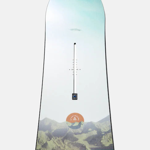 Burton Women's Family Tree Story Board B Grade Snowboard 2024 - A snowboard with a light blue-green top and a mountain range design at the bottom.
