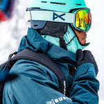 Anon Merak Wavecel Helmet 2023 - A black helmet with a white logo on the side and a strap under the chin.