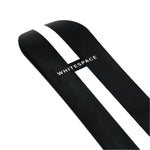 Whitespace Freestyle Shaun White Pro Snowboard 2024 - A black snowboard with a white stripe down the middle and a distinctive "S" logo on the top.