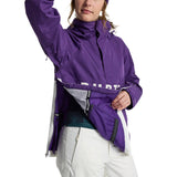 Burton Women's Frosnter Anorak Jacket 2025 - A purple jacket with a high collar and zippered pockets, featuring white lettering on the front.