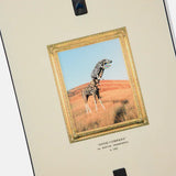 Burton Good Company Snowboard 2025 - A snowboard with a white background and blue text that reads "Good Company" in a stylized font, featuring a mountain range silhouette at the top.