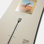 Burton Good Company Snowboard 2025 - A white snowboard with a black and red logo on top of it.