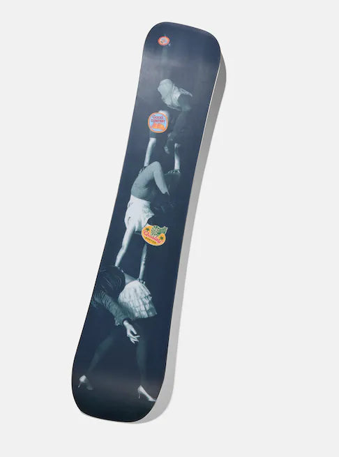 Burton Good Company Snowboard 2025 - A black snowboard with a white logo and text on top, featuring a man riding it in mid-air.