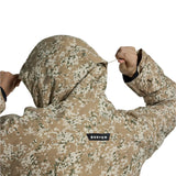 Burton Covert 2.0 2L Insulated Jacket 2025 - A tan jacket with a green and white snowflake pattern, featuring a hood and black accents on the cuffs and zipper.