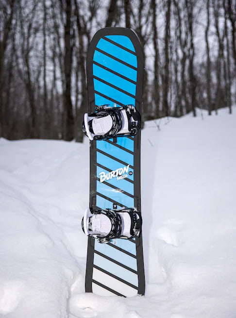 Burton Junior's Smalls Snowboard 2025 - A blue snowboard with black stripes and a black border, featuring the word "BURTON" in white letters on its side.
