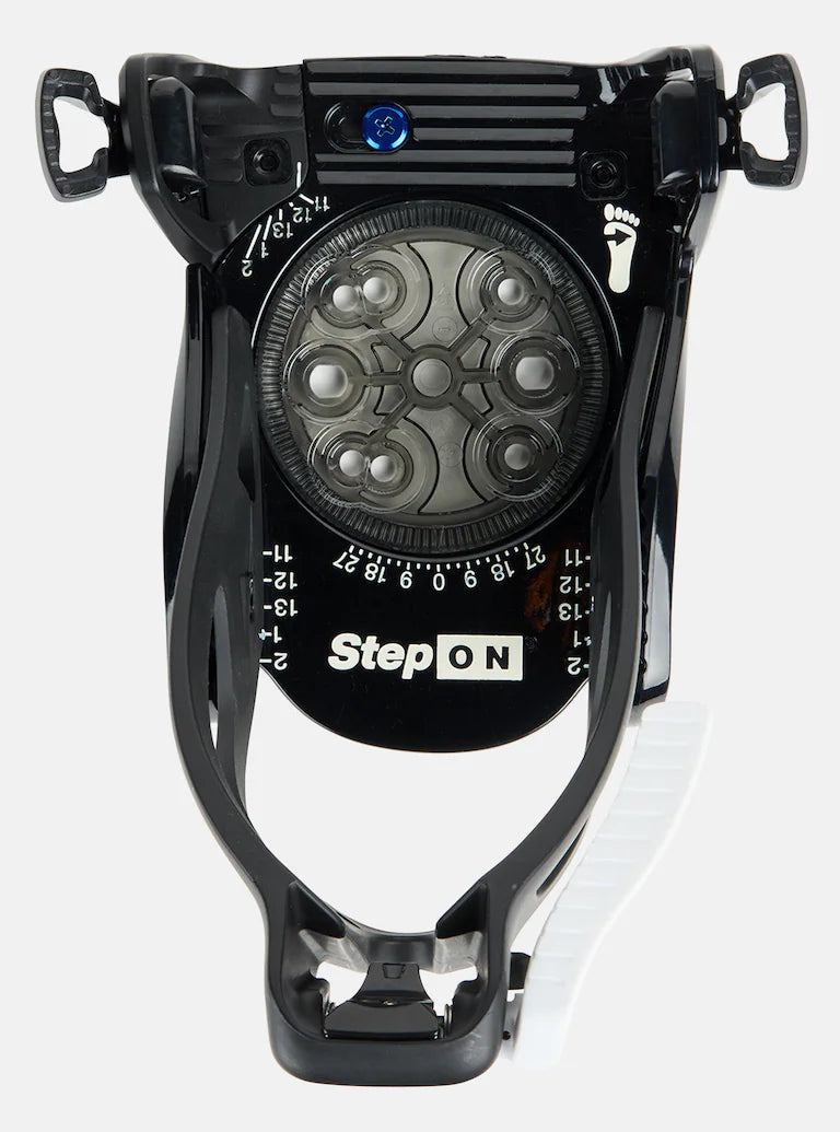 Burton Junior's Grom Step On Snowboard Bindings - Black bindings with silver buckles and straps on a white background.