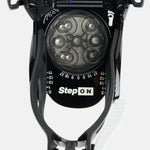 Burton Junior's Grom Step On Snowboard Bindings - Black bindings with silver buckles and straps on a white background.