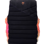 Hyperlite Women's Cadence Comp Vest 2024 - A black vest with a subtle floral pattern and orange accents on the straps.