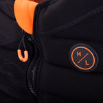 Hyperlite Women's Cadence Comp Vest 2024 - A black and orange women's vest with a zipper down the front.