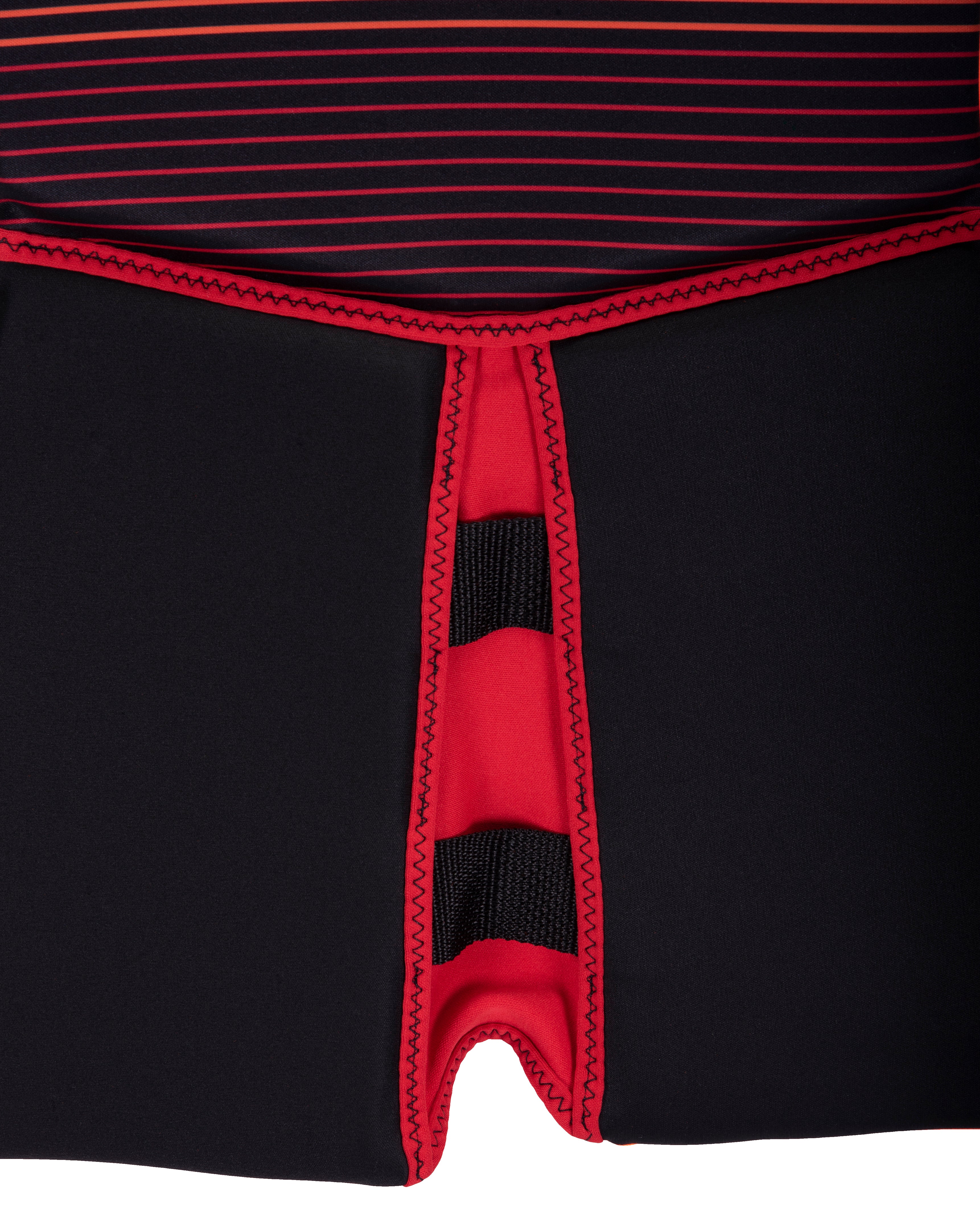 Hyperlite Junior's Indy CGA Vest 2024 - A black life jacket with a white logo on the chest and red trim around the armholes.